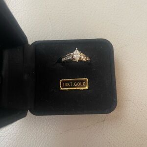 Elegant 14K Gold .25 ct solitaire diamond ring, channel diamonds, size 7
